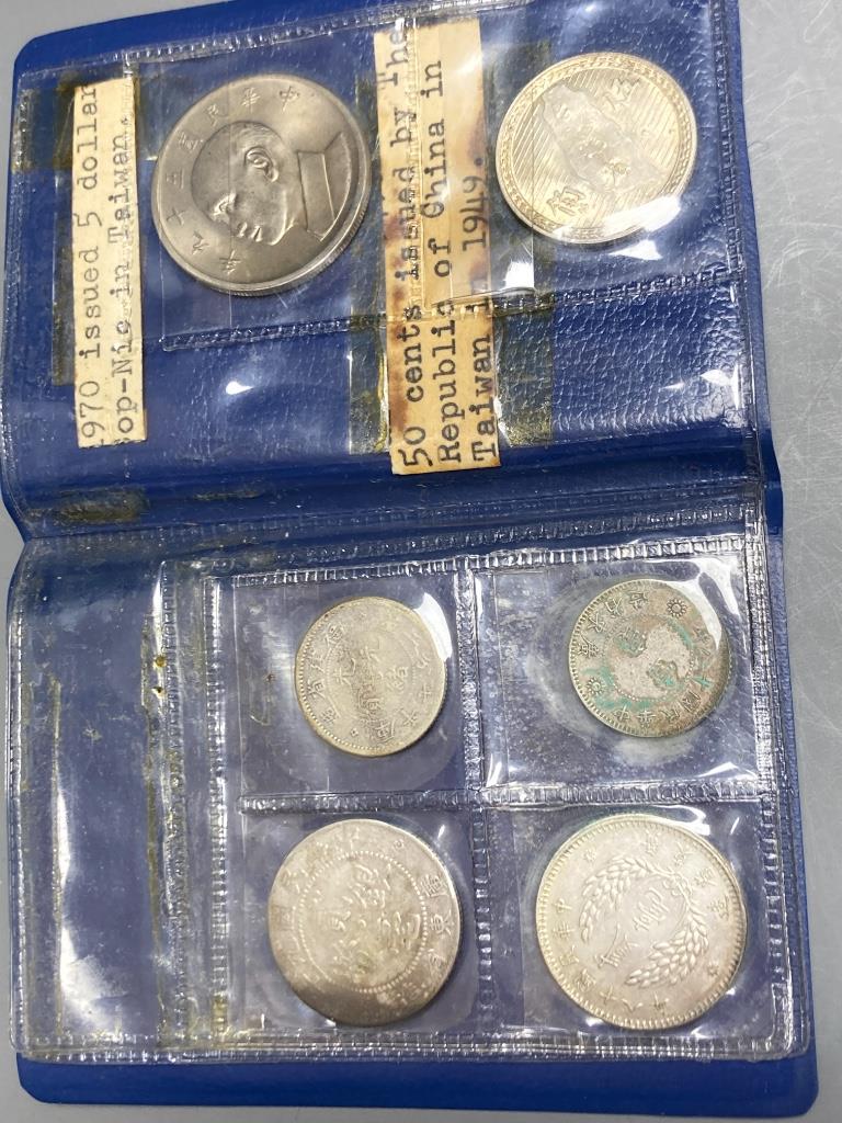 Two USA silver dollars, 1883 and 1903, a Chinese 1914 silver dollar, sundry Chinese and Taiwanese coins, etc.